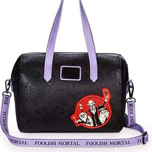 Hard to get loungefly haunted mansion barrel bag